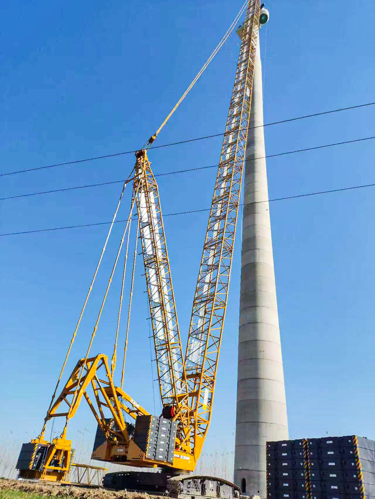 160米高空精准“搭积木”：币游国际XLC15000M分体吊装6.25兆瓦风机全纪录